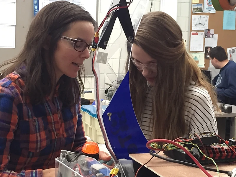 Mrs. DiCarlo & Shannon checking the connections