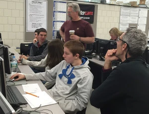 Jared Sophie & Hunter reviewing some drawings with Mr. Bersing & Mr. Derry