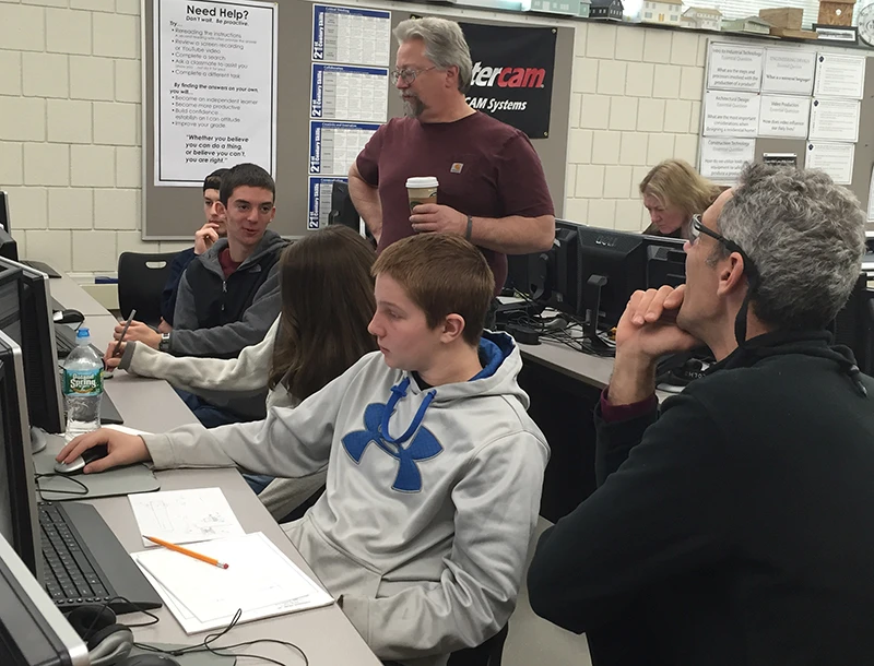 Jared Sophie & Hunter reviewing some drawings with Mr. Bersing & Mr. Derry