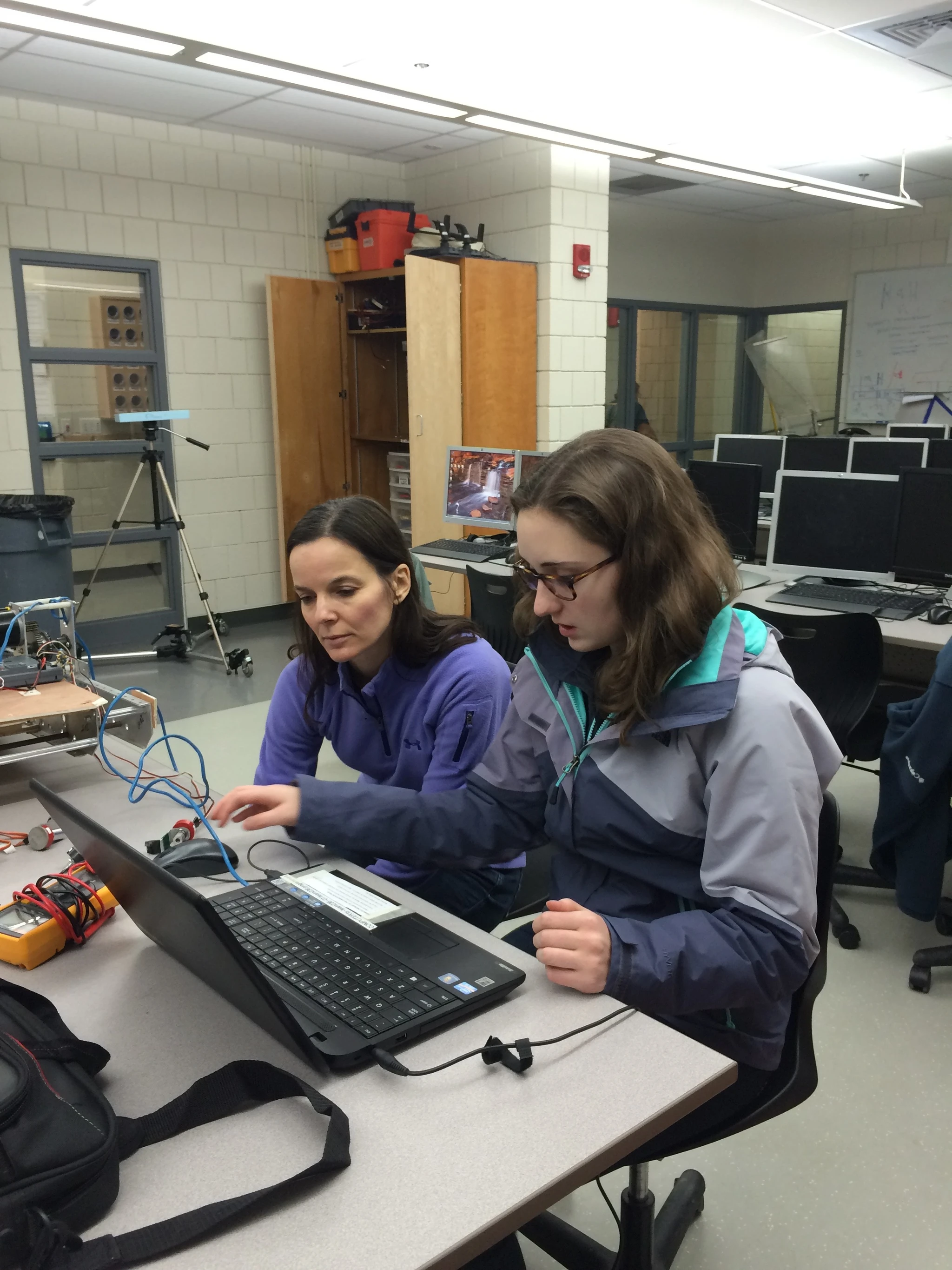 Alexis and Mrs DiCarlo test the encoders