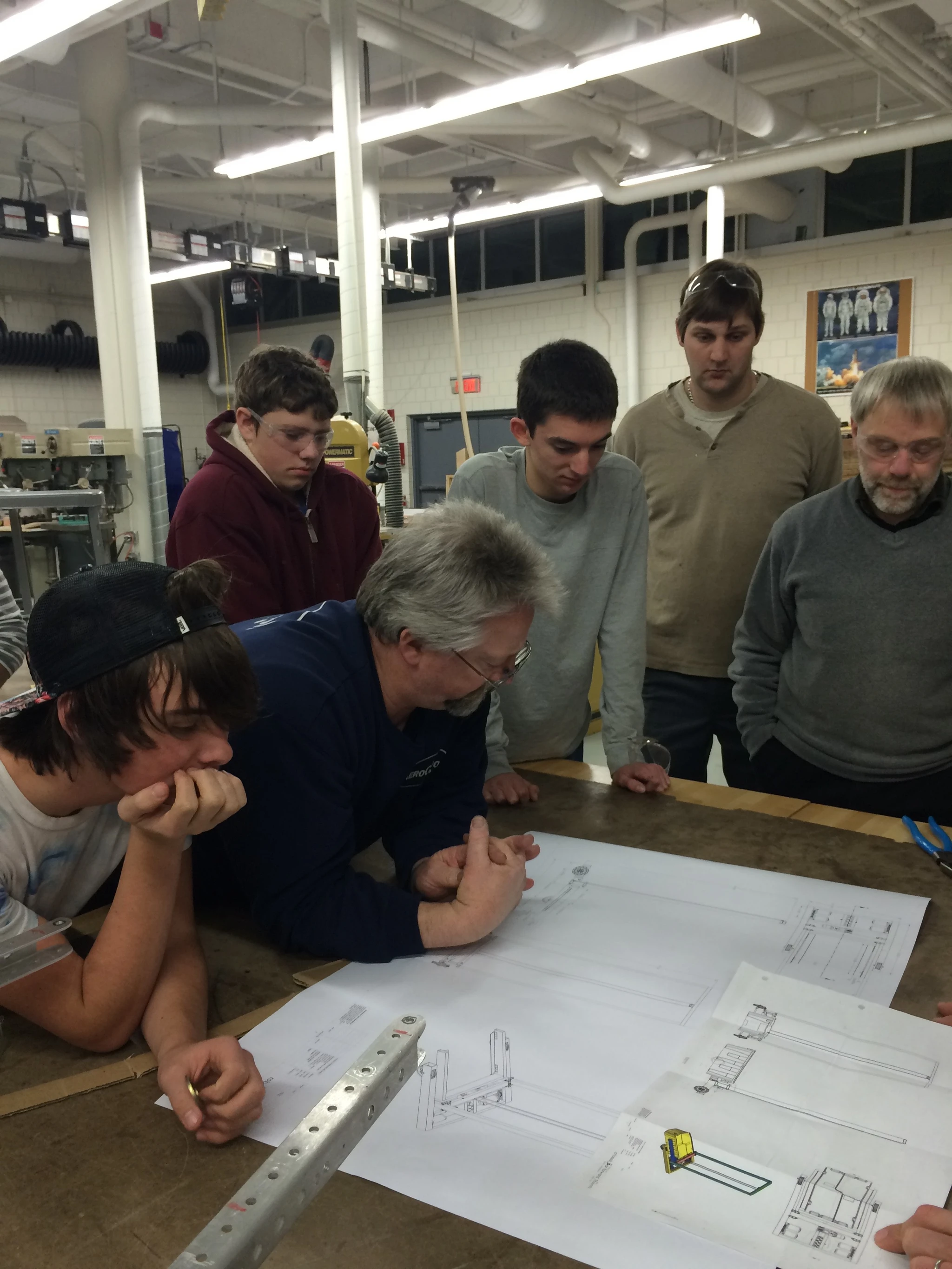 Team meeting to discuss the design of the elevator