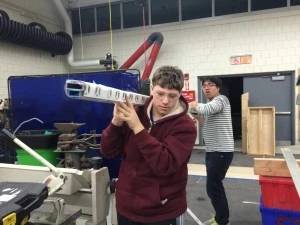 Sam and Nick Carrying in the box