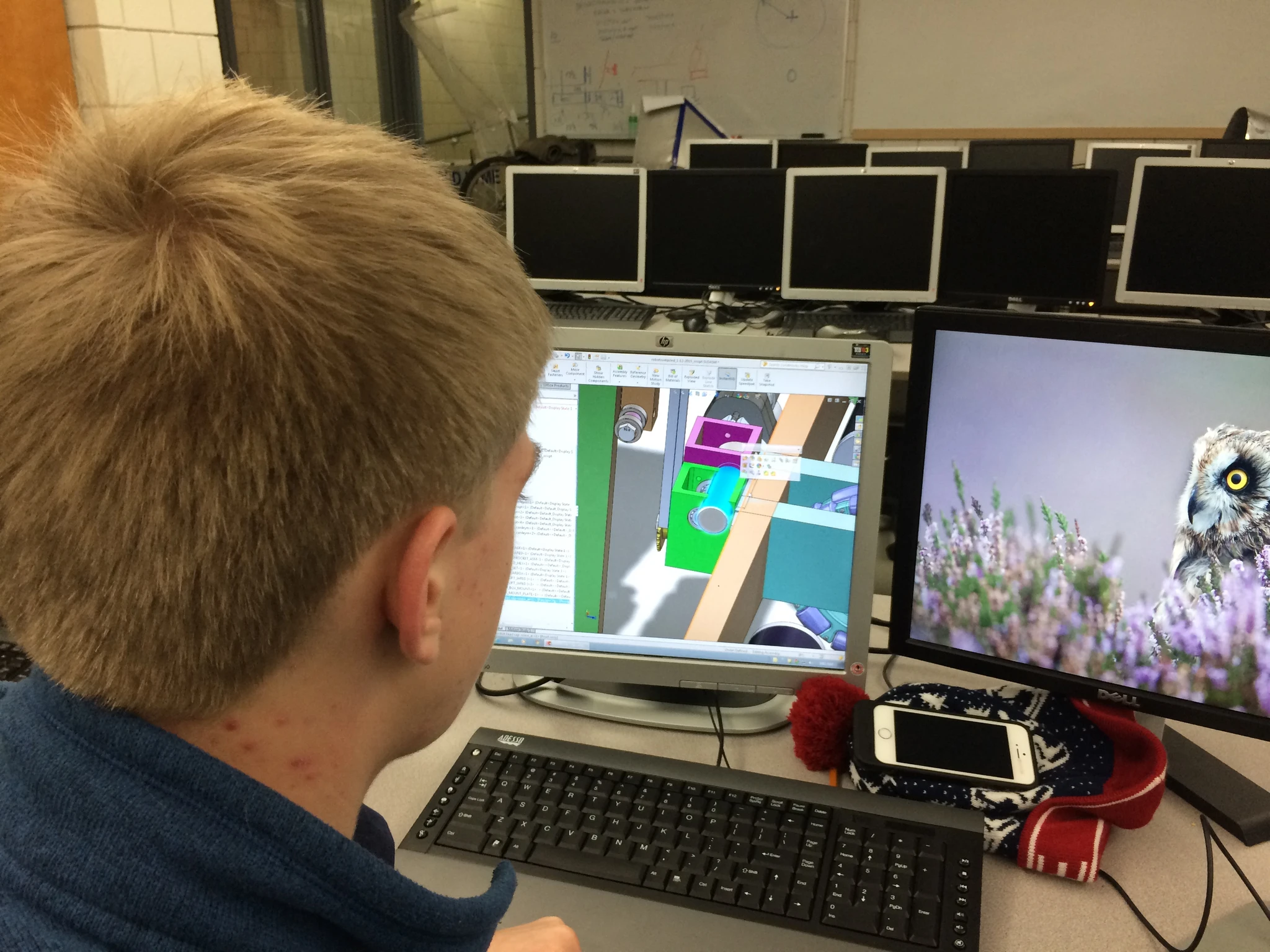 Tom works on solidworks designing and testing the PWM wires and planning the code and mounting encoders on the transmitters