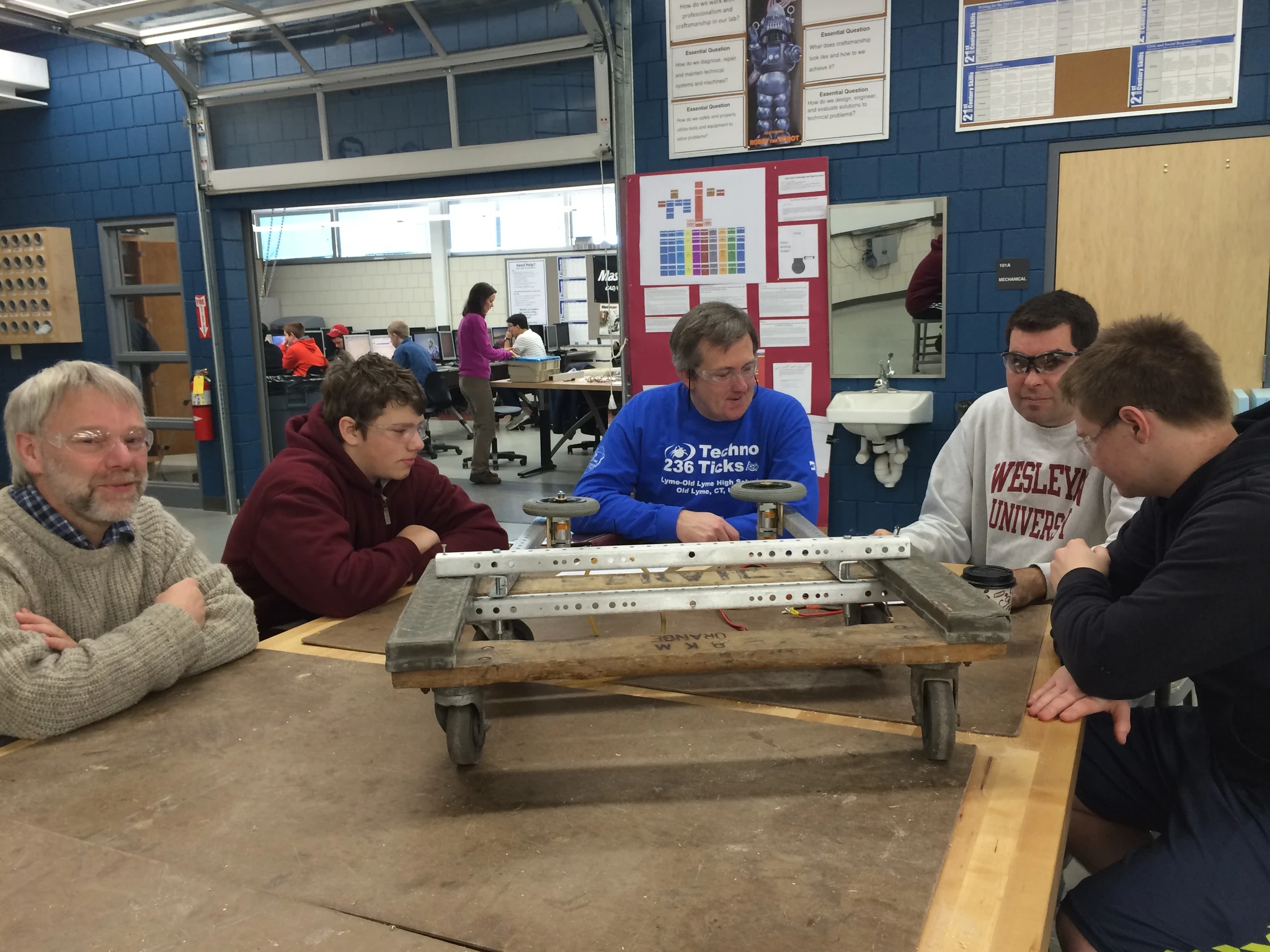 The intake team with Sam and Hayden work on refining the prototype and integrating the intake with the forks. Their work plan also included working on the space available and location.