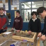 David and the Fork team (Sam, Ethan & Cole) work on making spring bushings and cutting steel hinges for the Forks.  They are also working on CAD work to determine where the lightening holes should go.