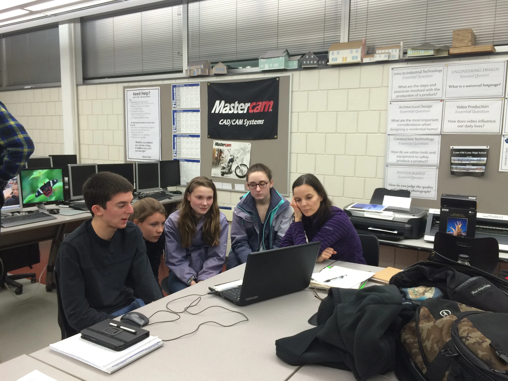 Jared gives the programming group a lesson - Sophie, Avery, Shanon, Alexis as they start to write the code for the PID Elevator Control