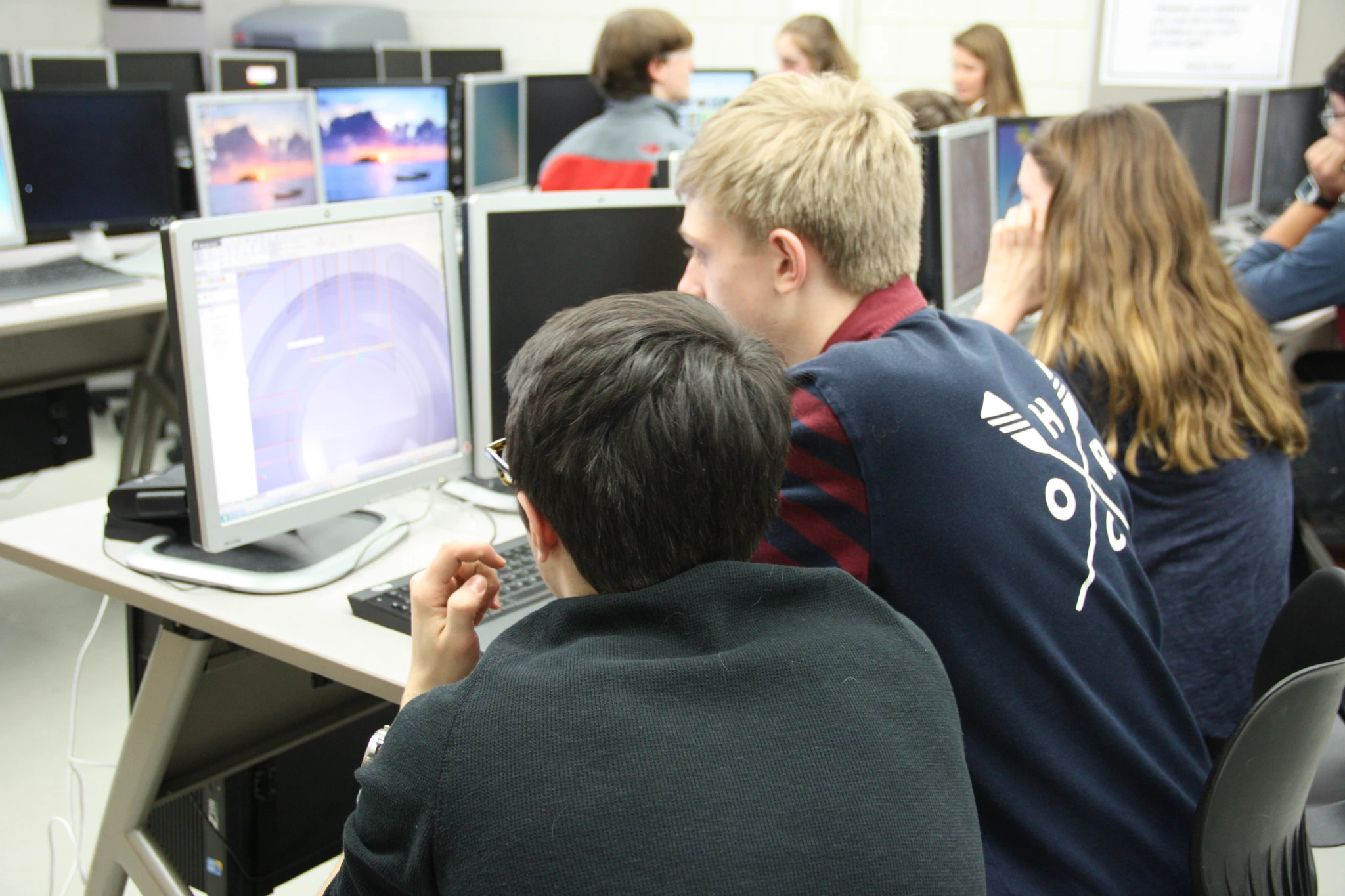Avery and Tom work in Solidworks to design the "Cone"